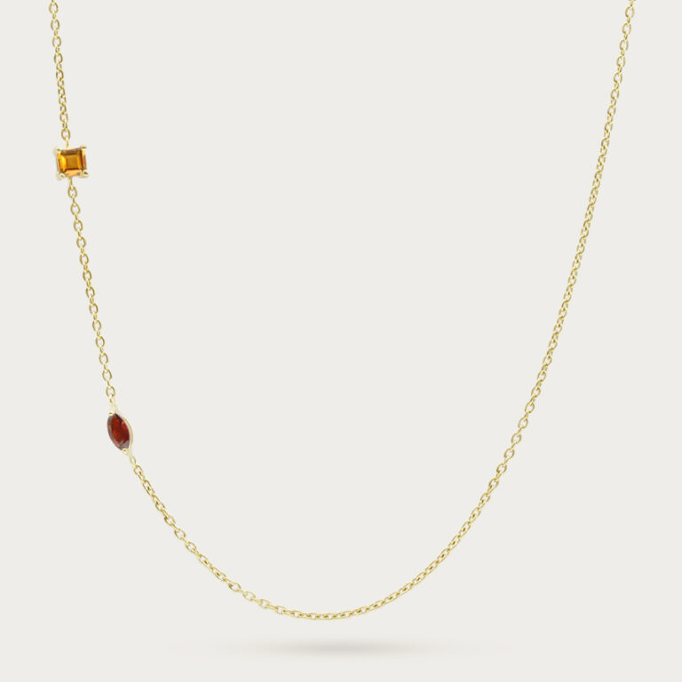 Fine chain necklace with a single set gemstone