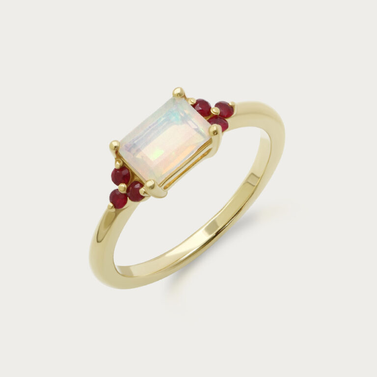 Ring set with an octagon stone and six round stones