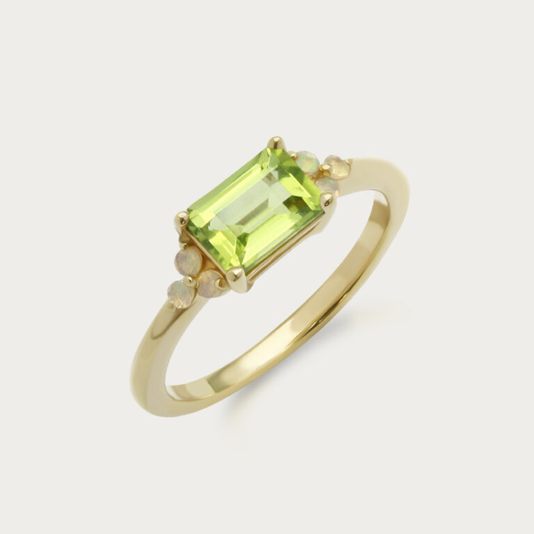 Ring set with an octagon centre stone and six round stones