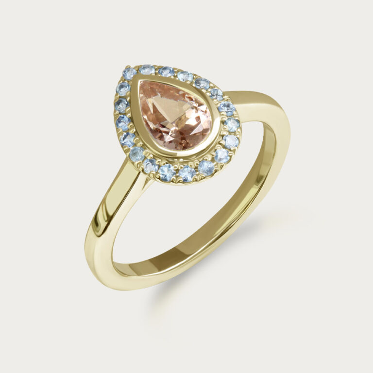 Teardrop halo ring set with aquamarine