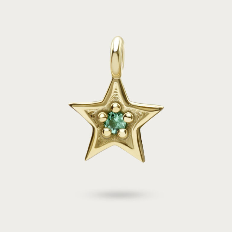 Gold star charm set with a single stone