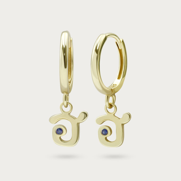 Huggie earrings with the Thai letter set inside the hoop
