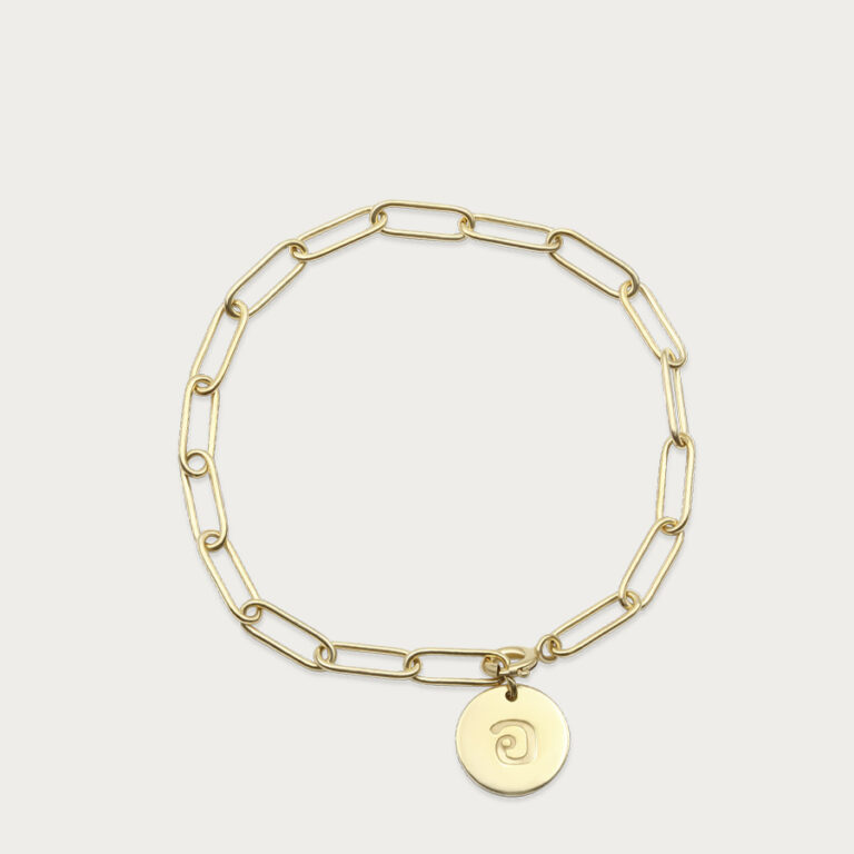 Gold bracelet hung with round disc charms